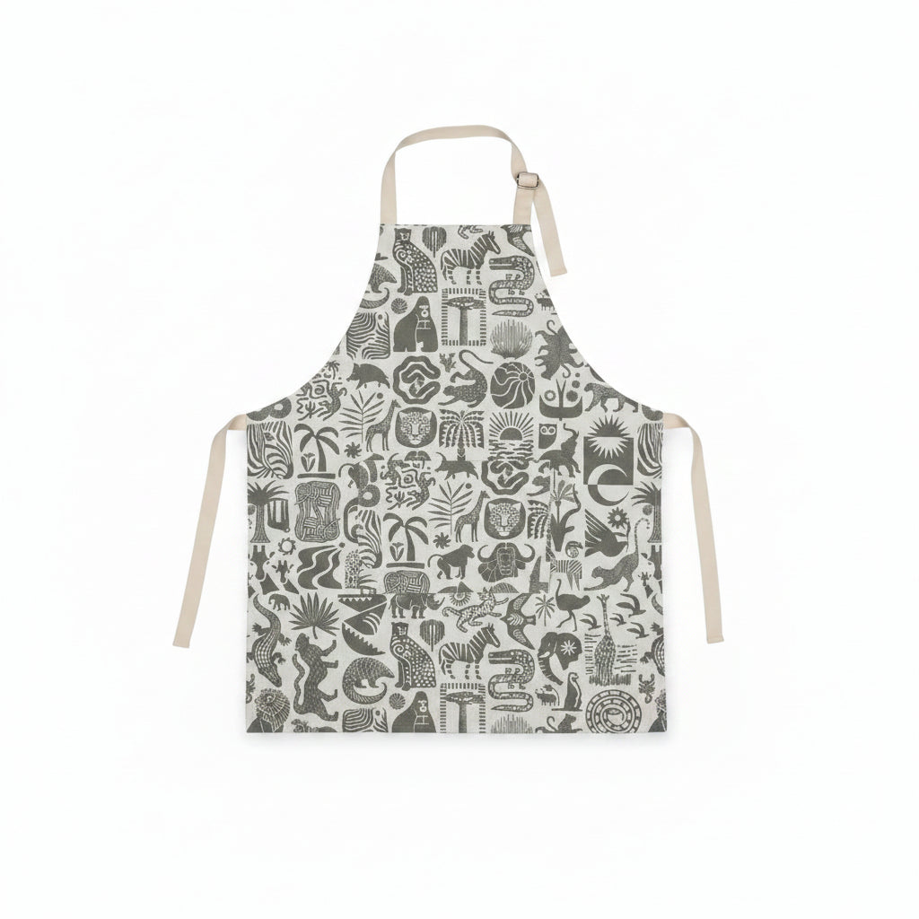 Patterned apron with animal designs on a white background