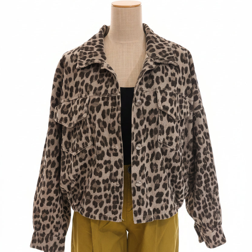 Leopard print jacket on a mannequin with yellow pants