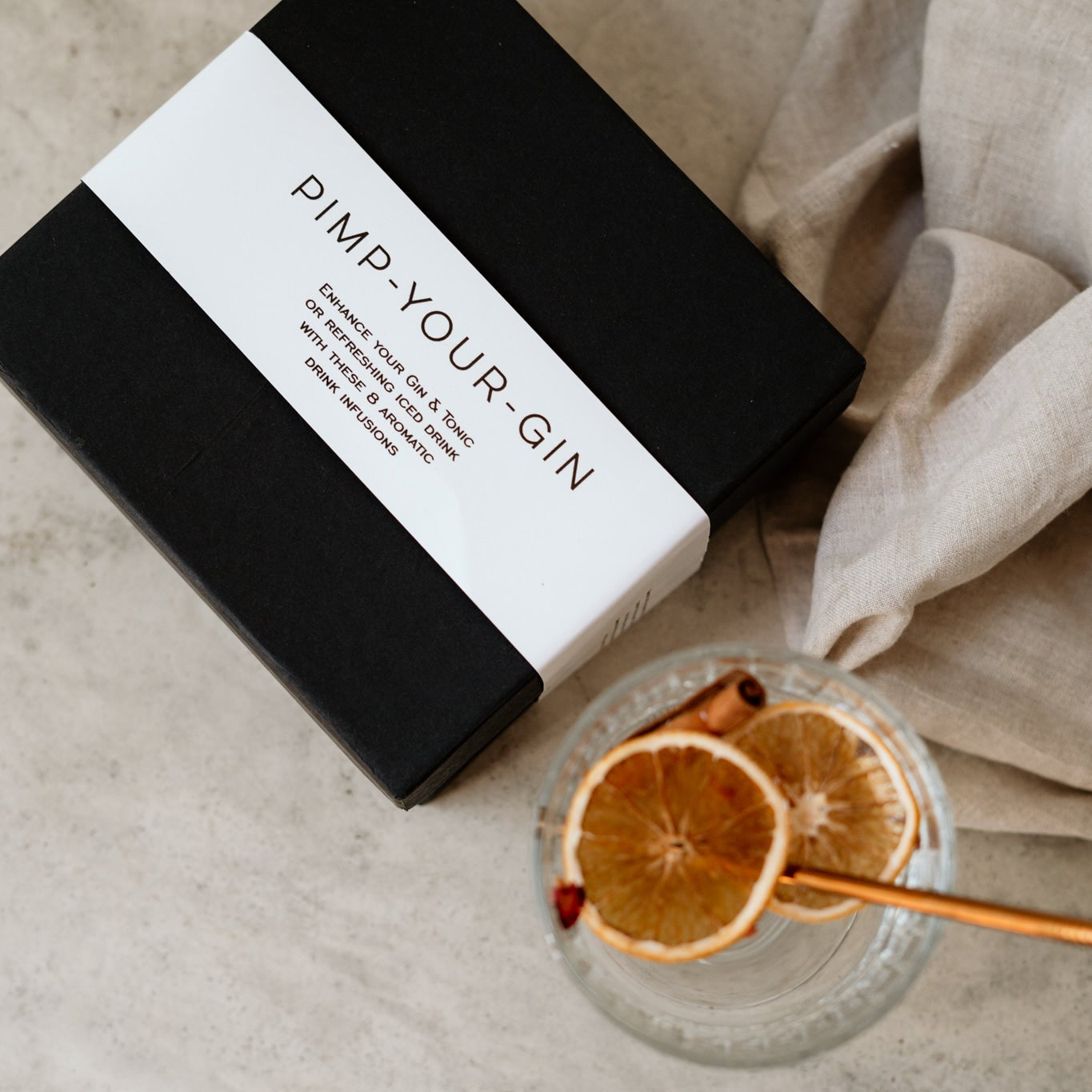 Black botanical gift box featuring 8 different drink flavour infusions