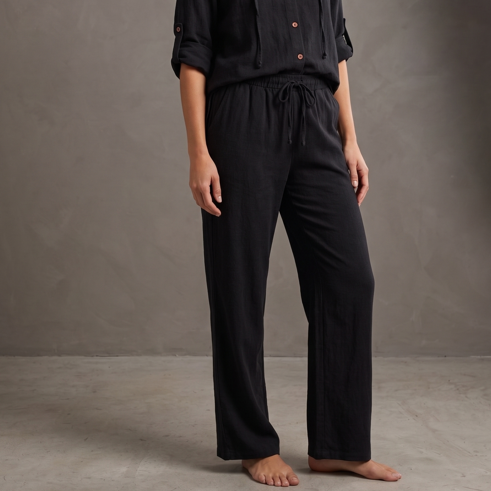 Lady wearing black drawstring linen pants