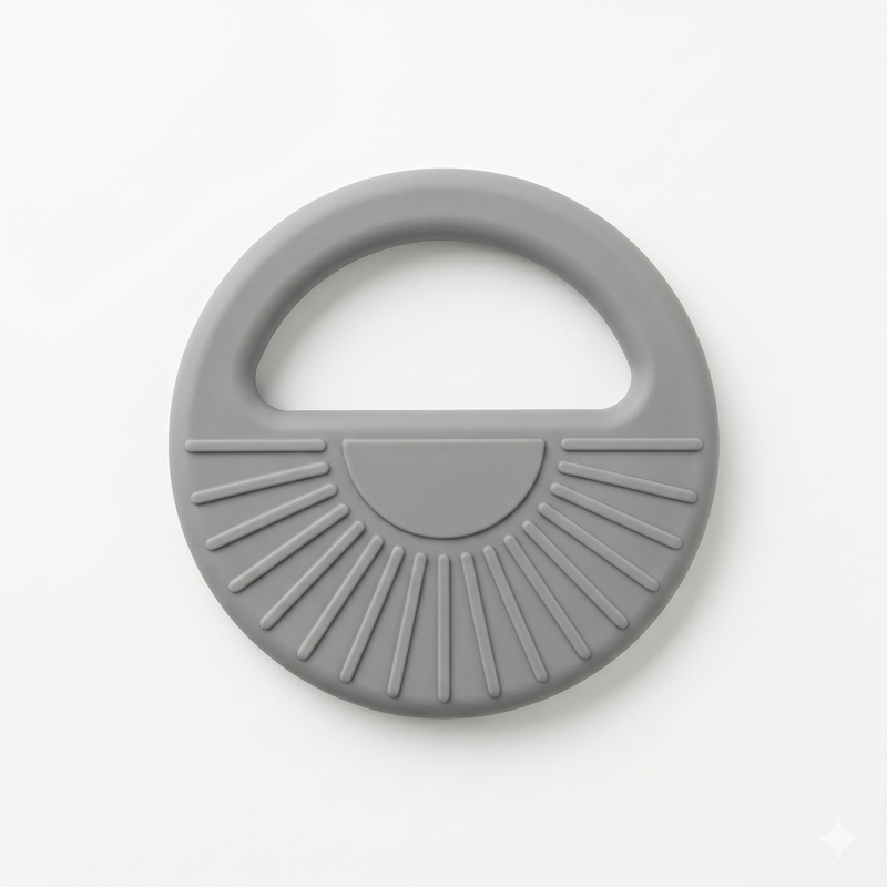 Gray silicone teething ring on a white background