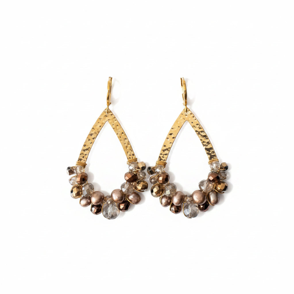 Teardrop fittings with regal jewel crystals in pearl and gold.