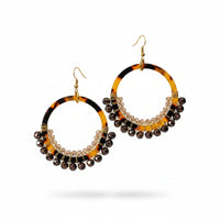 Acrylic Hoops wire wrapped by hand with glass crystal beads.