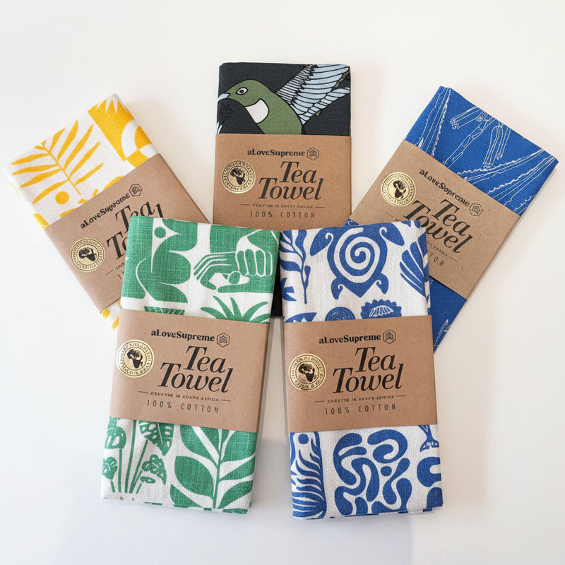 Range shot of South African design printed tea towels.